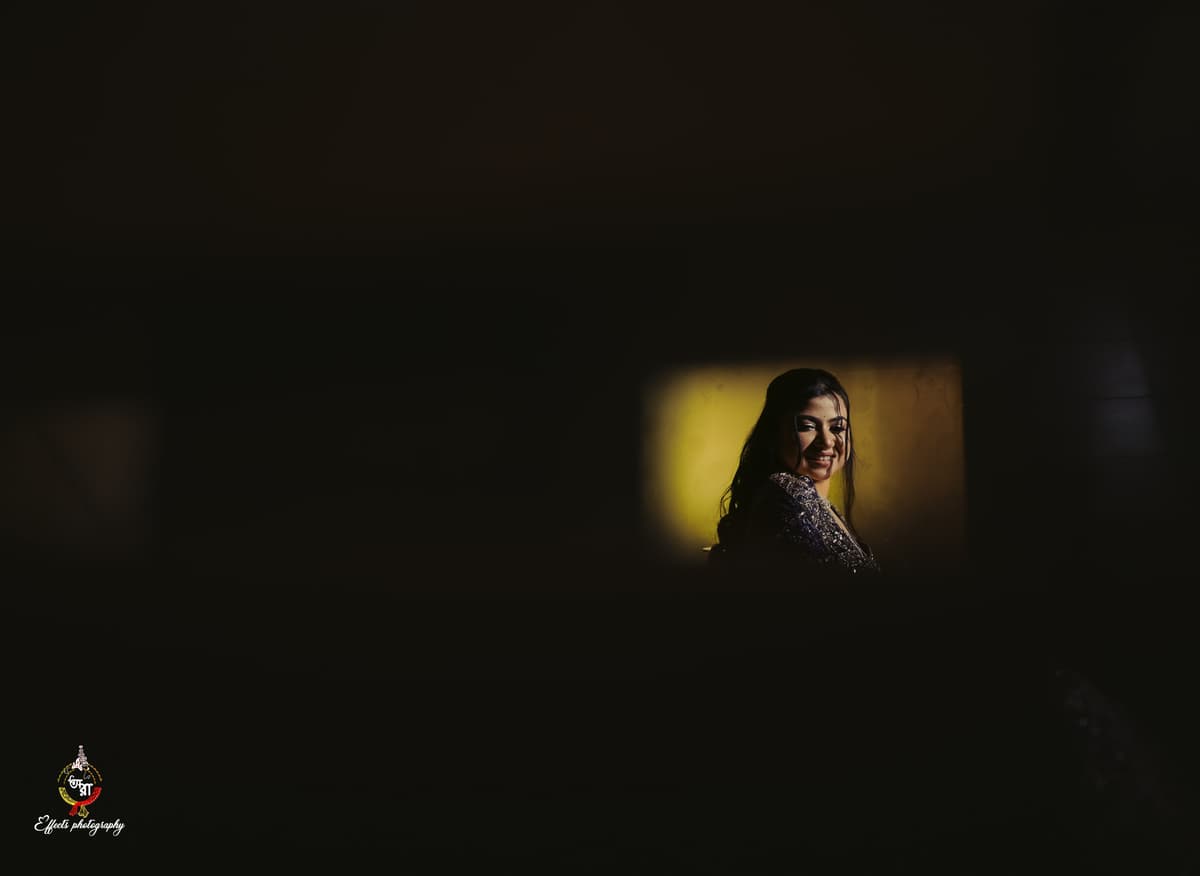 Candid groom portrait in traditional attire